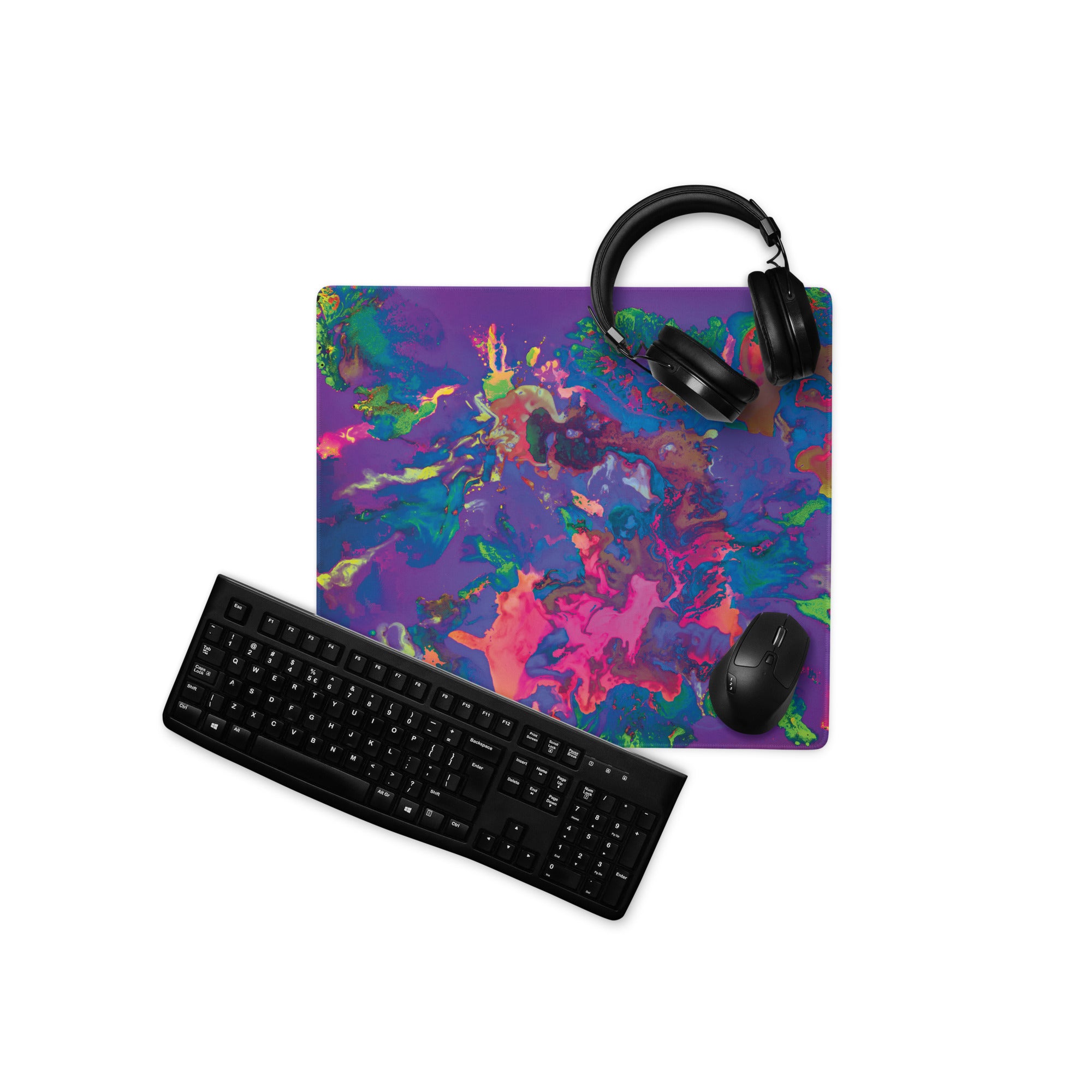Colorful mouse pad with keyboard, mouse, and headphones on a white background