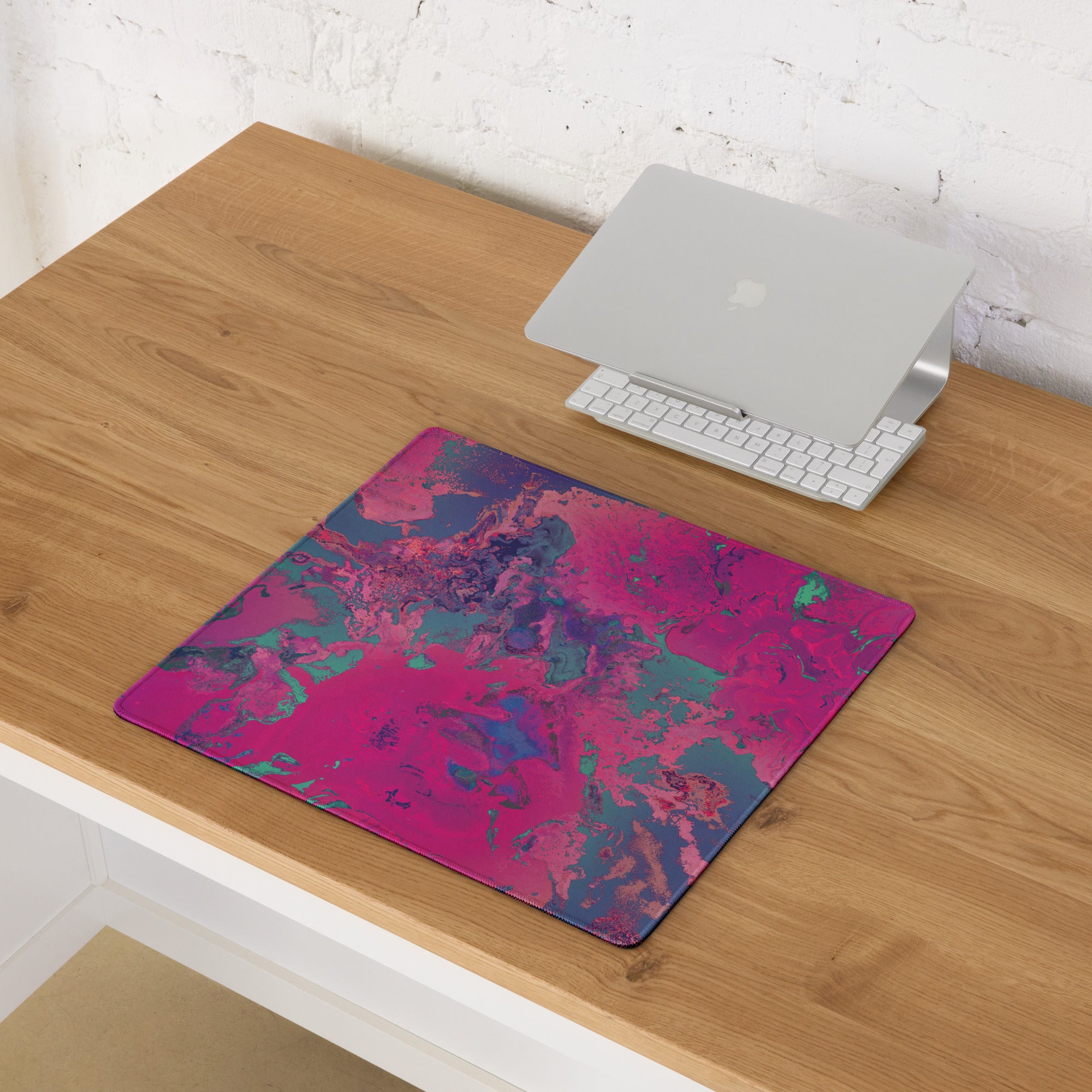 Magenta Gaming Mouse Pad on a Wooden Desk