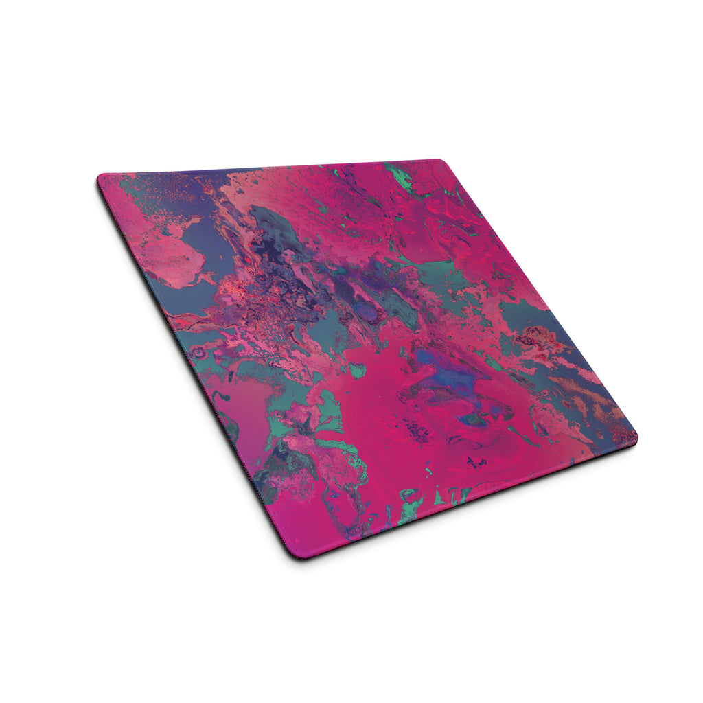 Colorful abstract design on a rectangular mouse pad with a white background