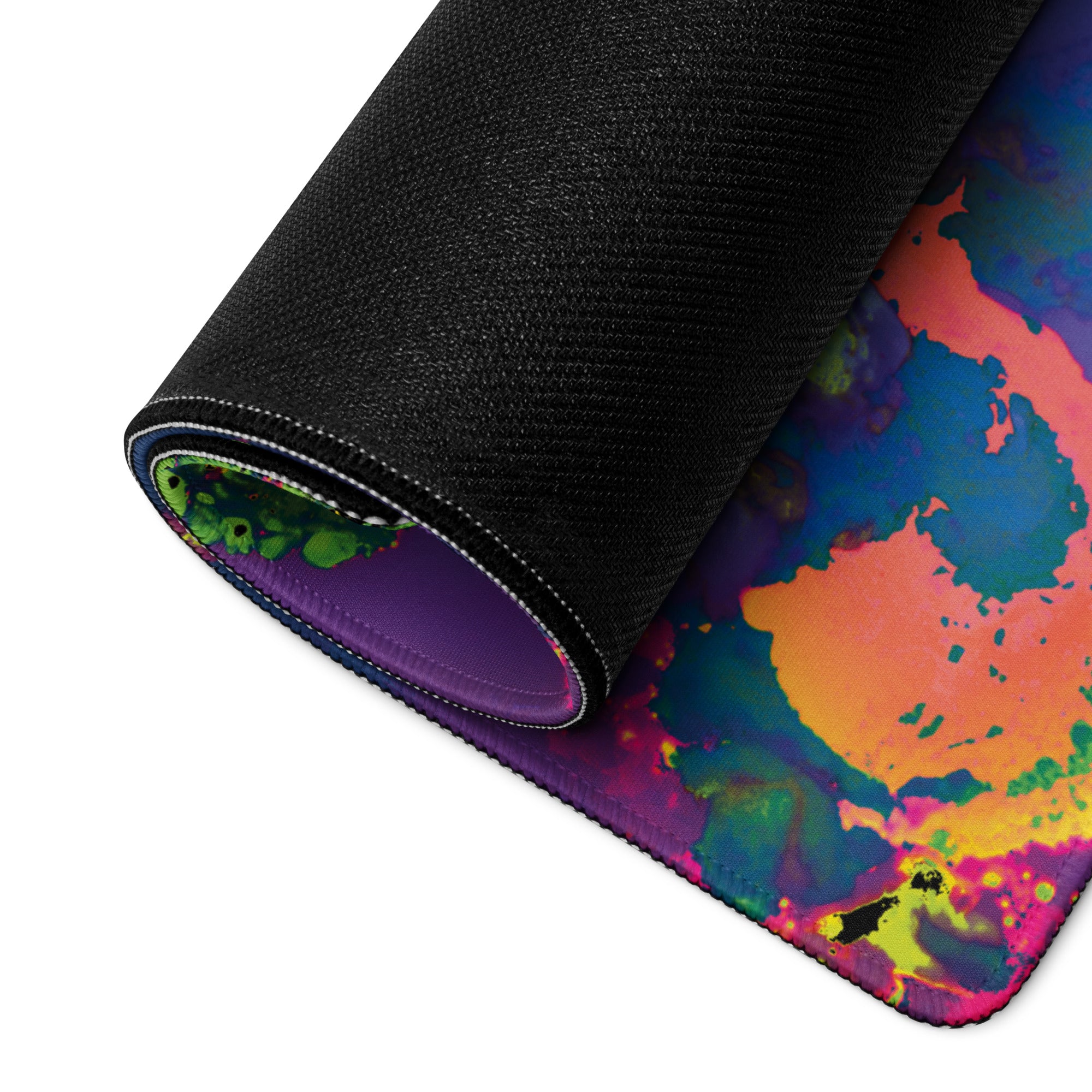 Colorful tie-dye mouse pad with black border on a white background