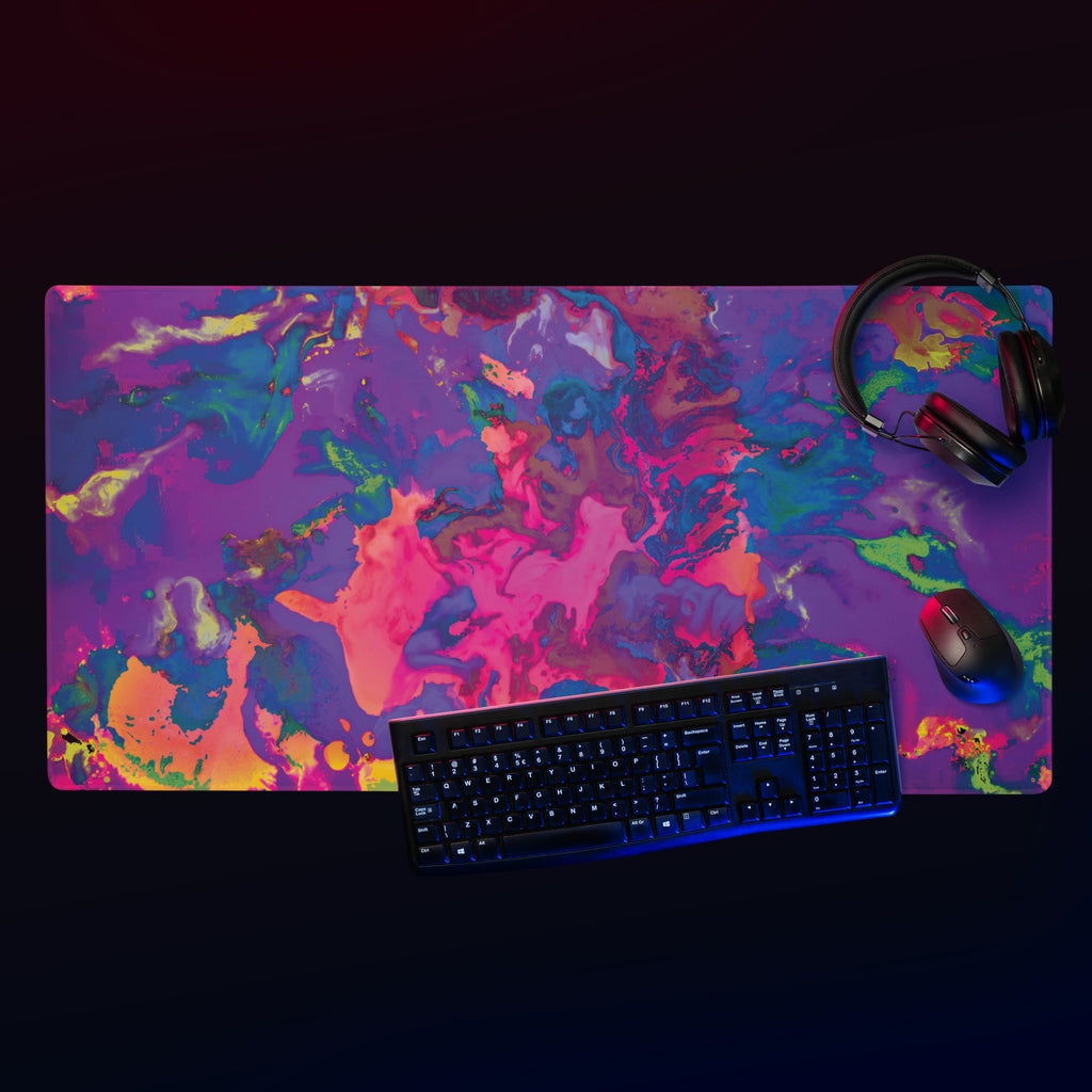 Colorful desk mat with a keyboard, mouse, and headphones on a black background