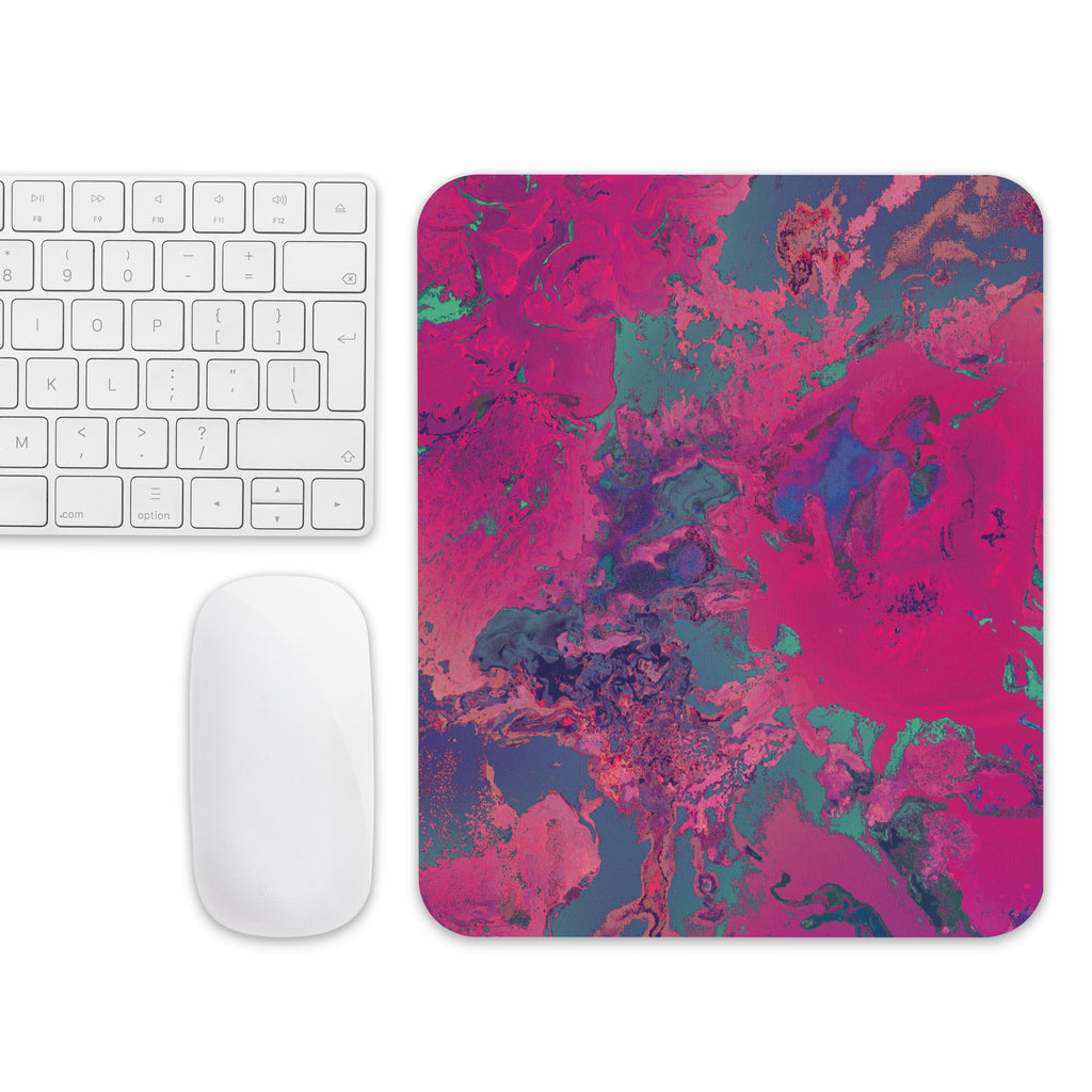 Colorful abstract mouse pad with keyboard and mouse on a white background